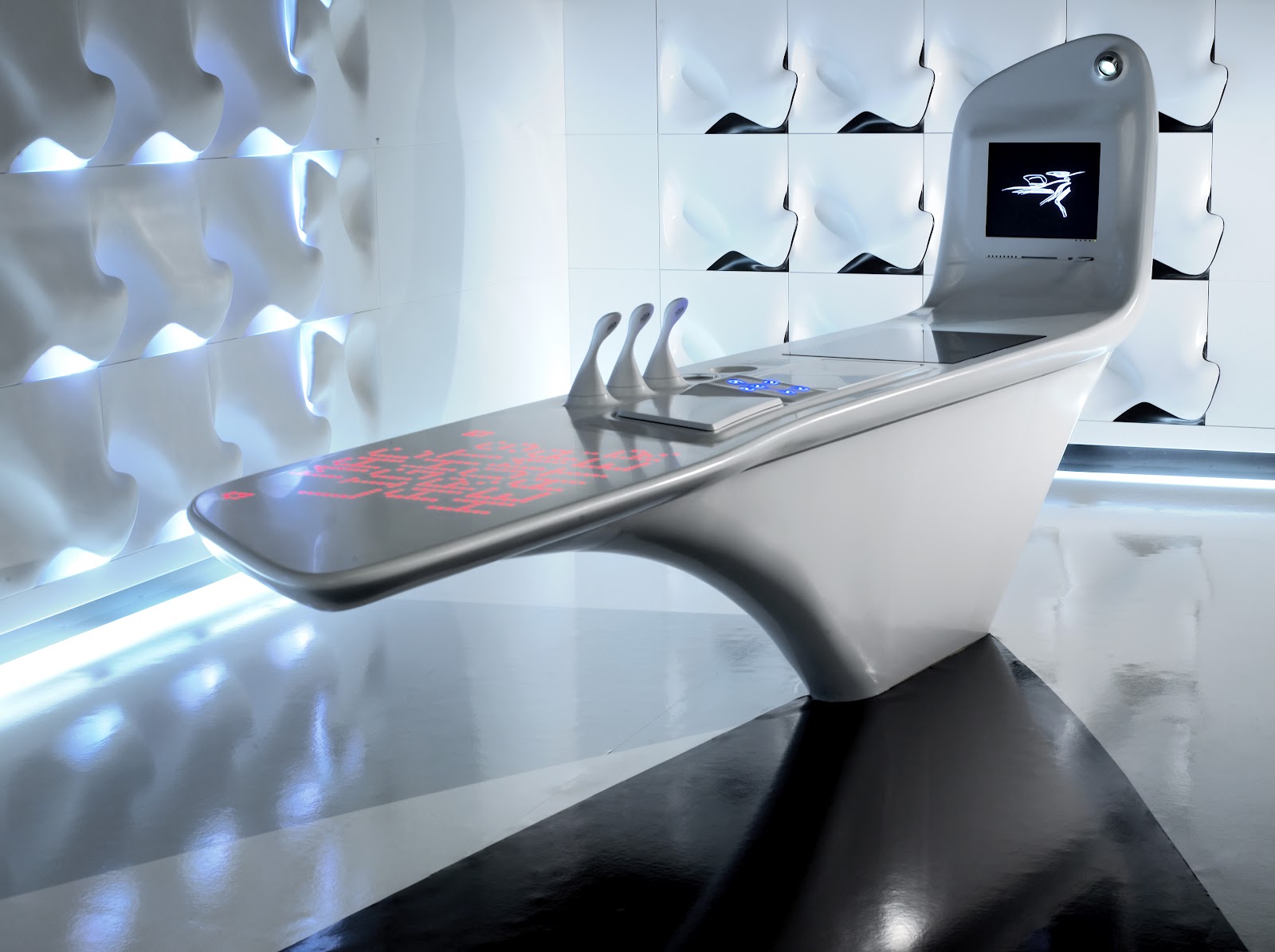 sites/corian.in/IMG/jpg/kitchen-and-wall-cladding-corian-z-island-by-zaha-hadid.jpg